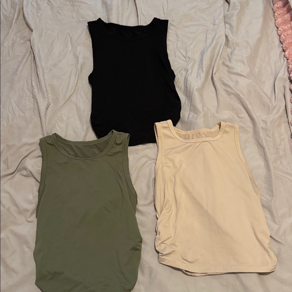 Set of Three Sleeveless Tops - Black, Green, and Cream